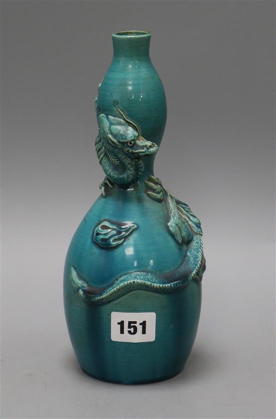 A Japanese turquoise dragon vase H.24cm